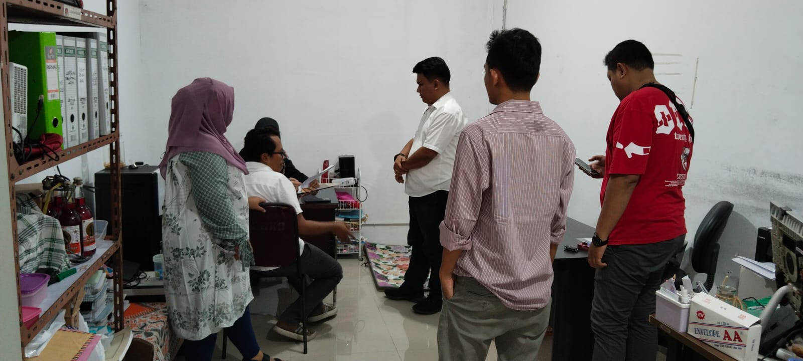 Anggota Bawaslu Kota Tebing Tinggi Lambok Simbolon dan Elfian Choky Nasution