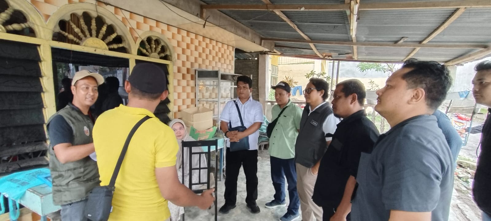 Anggota Bawaslu Kota Tebing Tinggi Elfian Choky Nasution dan Lambok Simbolon