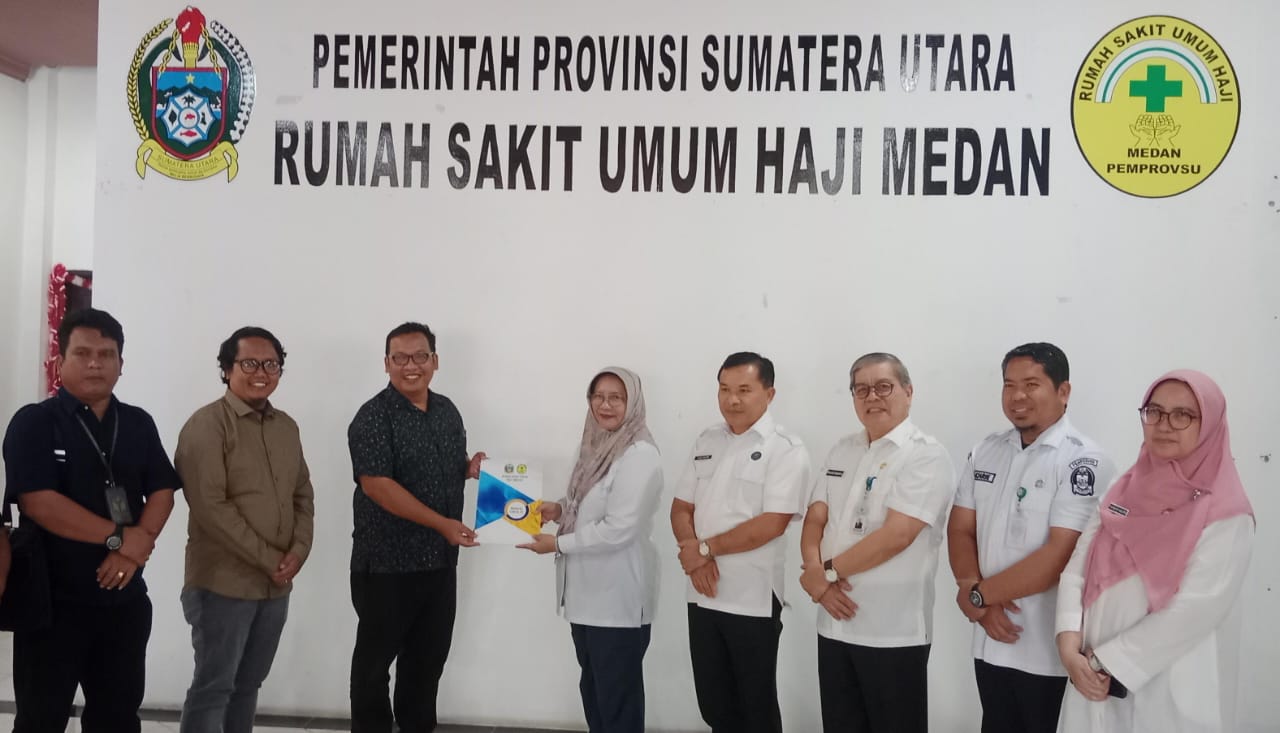 Anggota Bawaslu Kota Tebing Tinggi Elfian Choky Nasution dan Lambok Simbolon