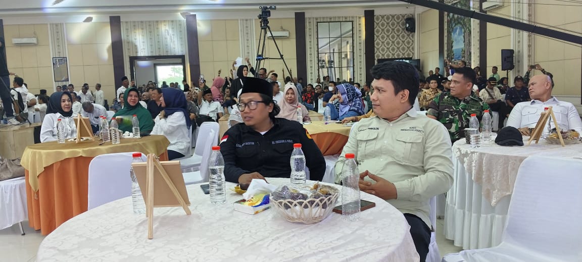 Anngota Bawaslu Kota Tebing Tinggi Elfian Choky Nasution dan Lambok Simbolon