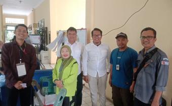 Anggota Bawaslu Kota Tebing Tinggi Elfian Choky Nasution dan Lambok Simbolon