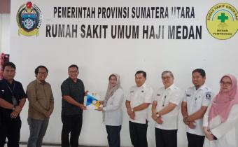 Anggota Bawaslu Kota Tebing Tinggi Elfian Choky Nasution dan Lambok Simbolon